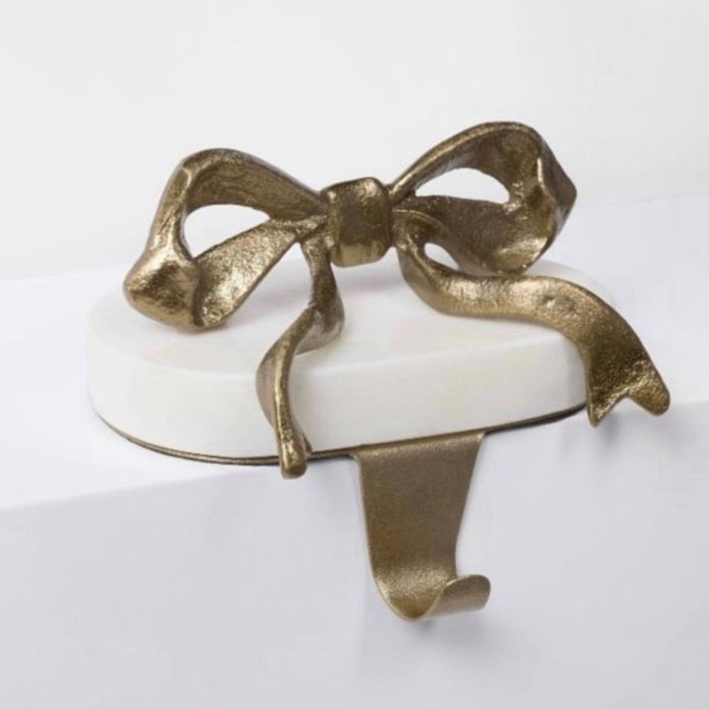 Threshold Studio McGee Marble and Metal Bow Christmas Stocking Holder Gold